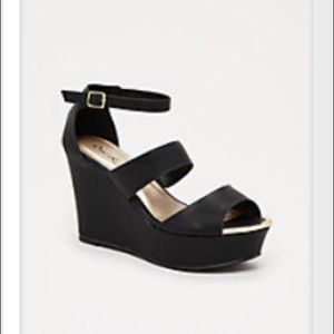 Black Metal Toe Wedge Heel